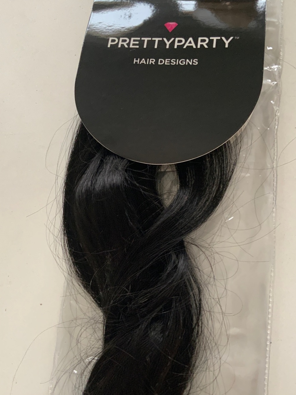 Pretty Party "Ruby" wired pony tail Extension in black brown.  Brand new